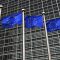 European Union flags fly in front of the European Commission headquarters in Brussels