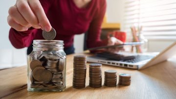 Business women are calculating daily expenses.
