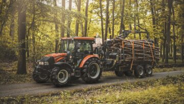 Forwarder,Tractor,For,Wood,Transport.,Tractor,With,Trailer,Loaded,With